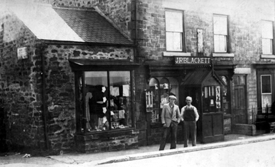 John Robert Blackett with his son Dennis outside the shop in Woodland